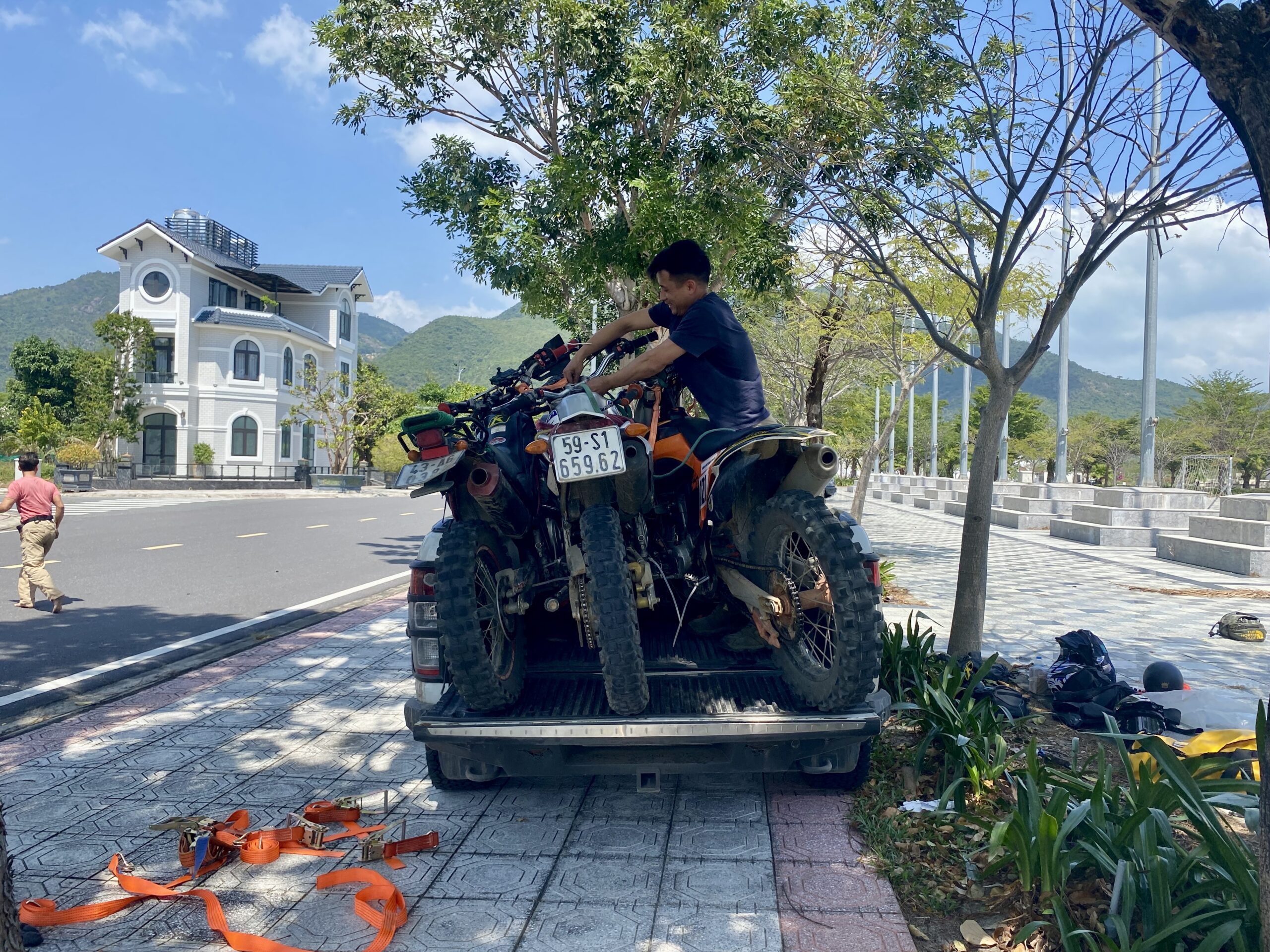 Motorcycle riders traversing mountain roads in Northern Vietnam